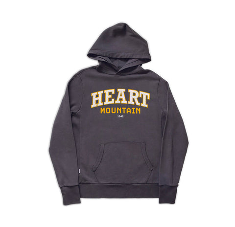 Dark grey hoodie with the words Heart Mountain appliqued on front in white and gold.