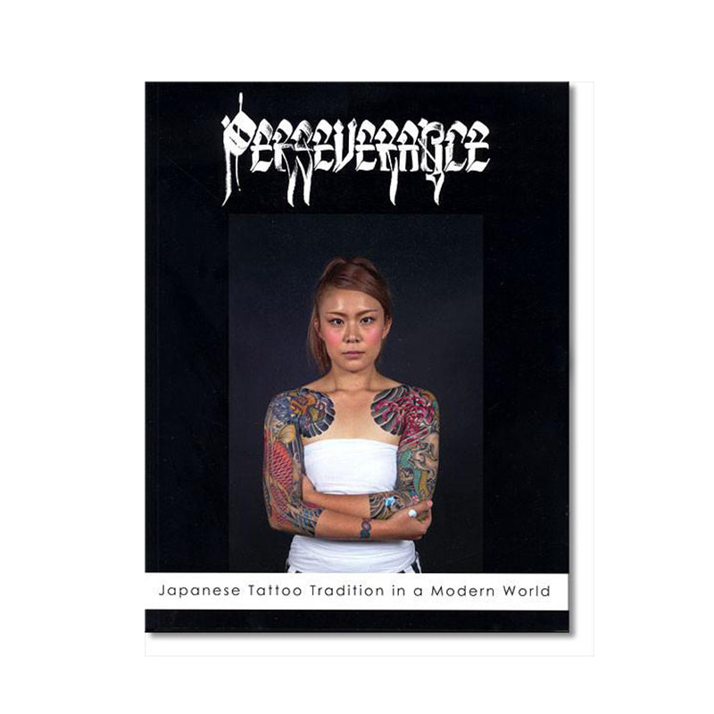 Catalog with picture of a woman with tattooed sleeves and staring at the camera