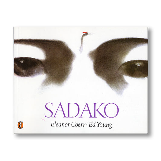 Book cover of 'Sadako' by Eleanor Coerr and Ed Young with a close-up of eyes and a red hairpin. 